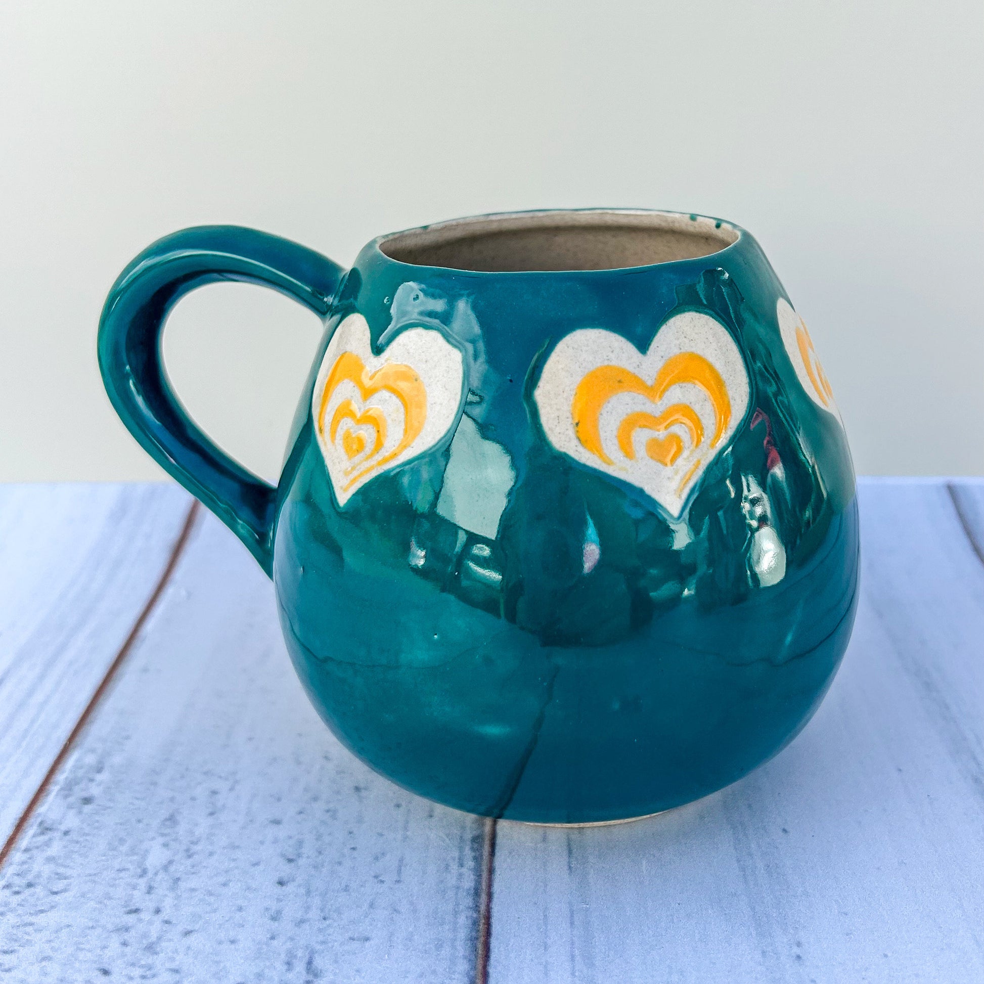 Teal and Orange Mug Pottery