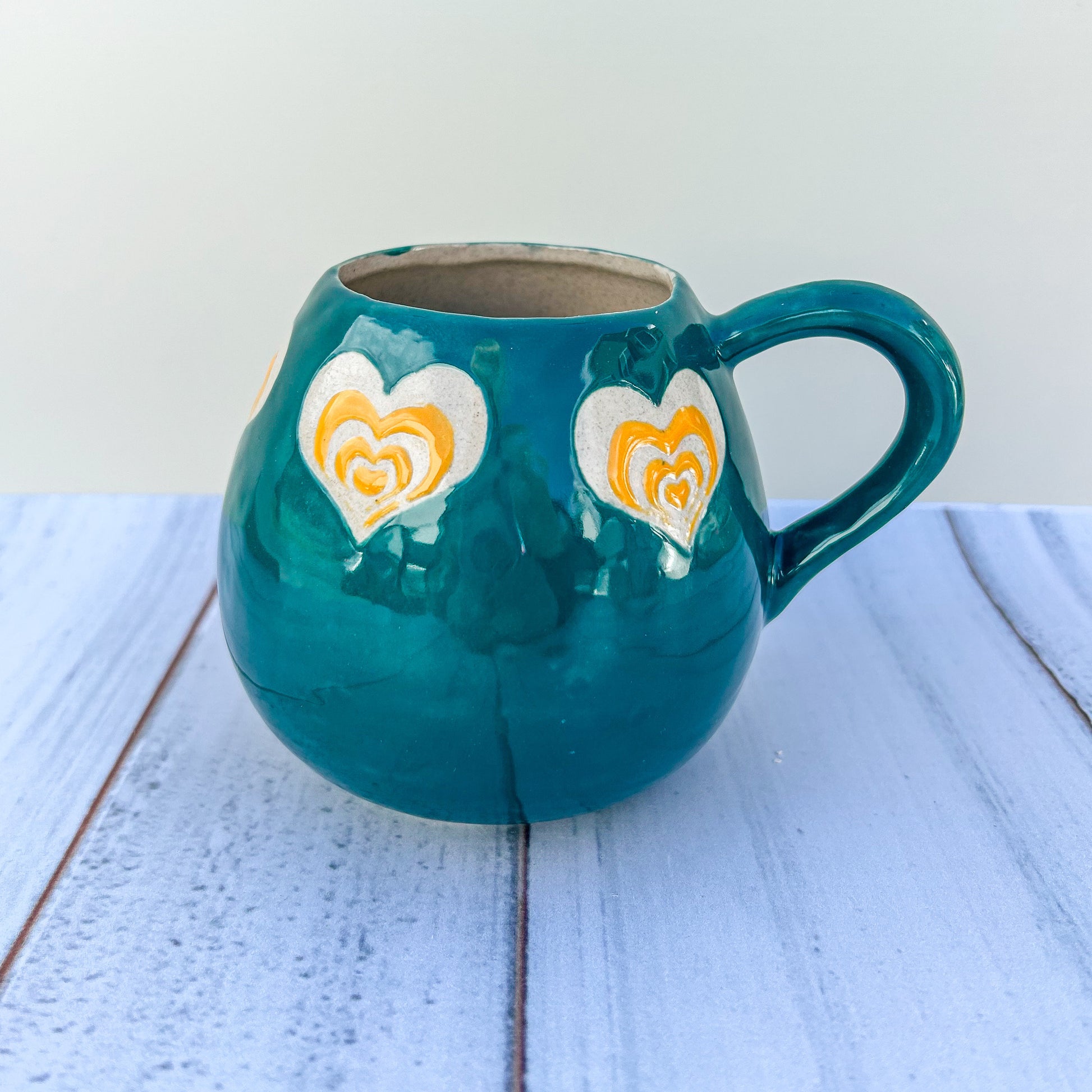 Teal and Orange Mug Pottery